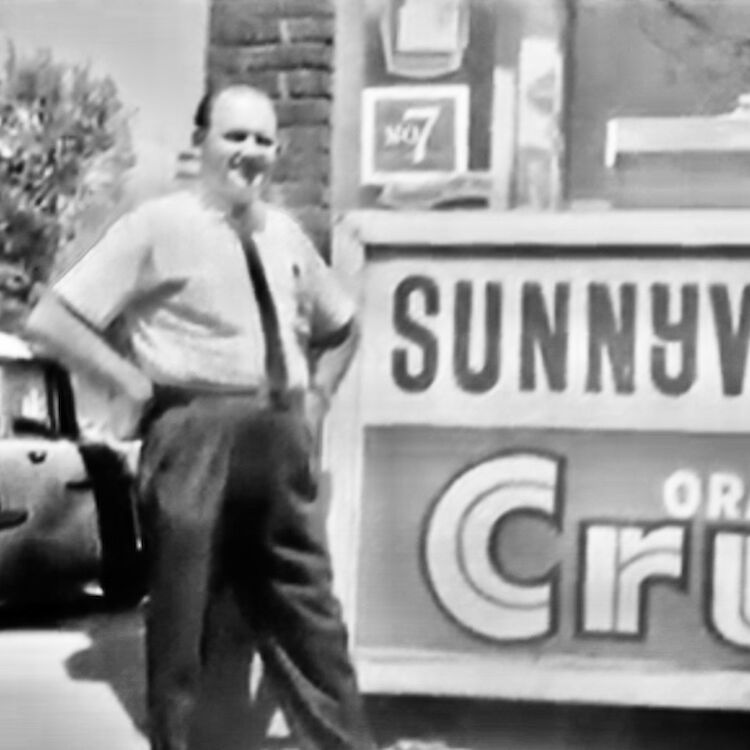 Steve Sromek and his restaurant sign at 41 Roncesvalles Ave. (Photo courtesy of the family.)