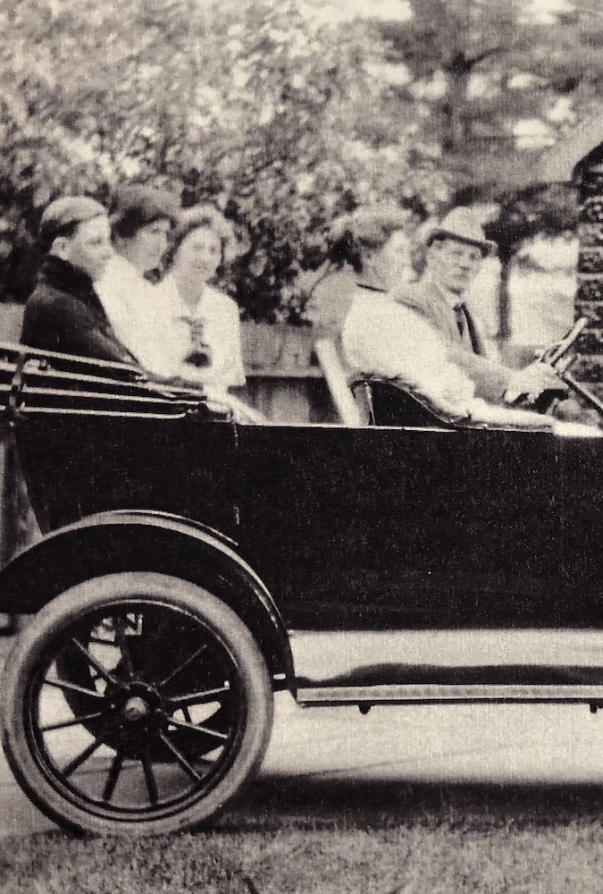 Above, William Moore drives a Model T, with wife Sarah Maria beside him and children Howard, Bessie and Eveline in the back. (Photo courtesy of the family.)
